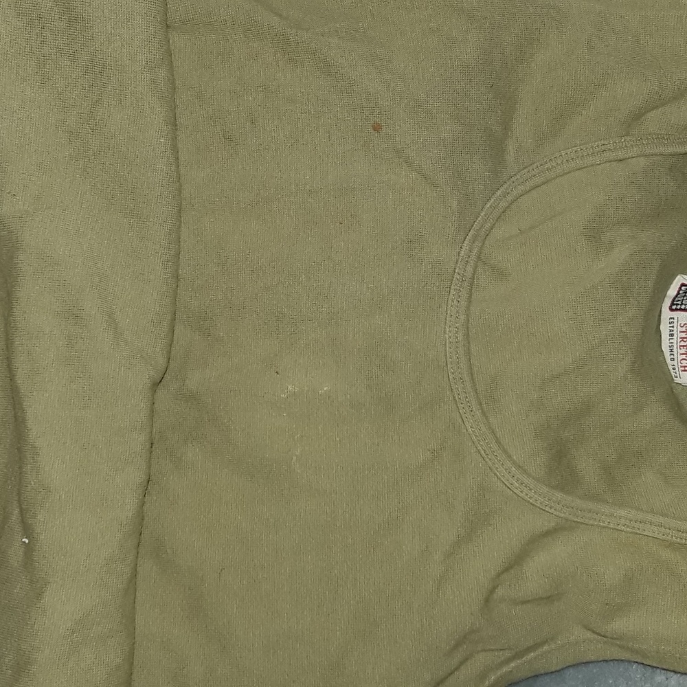 Green sleeveless shirt